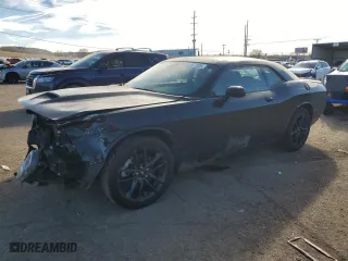 2021 Dodge Challenger GT with VIN 2C3CDZKG3MH677579, listed as a Copart auction lot 41977525 with 65,597 mi miles and Salvage Title. Bid and sale history available at carsss.com. Image 1.