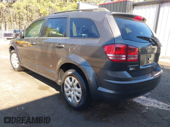2016 Dodge Journey SE with VIN 3C4PDCAB6GT104588, listed as a IAAI auction lot 41823732 with 133,819 mi miles. Bid and sale history available at carsss.com. Image 3.