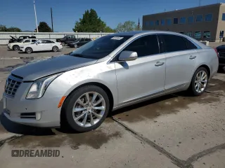 2013 Cadillac XTS Luxury z VIN 2G61R5S32D9131914, wystawiony jako Copart lot #56569505 z przebiegiem 123 427 mil mil oraz Szkoda całkowita • Salvage title. Historia ofert i sprzedaży dostępna na DreamBid. Obrazek 1.