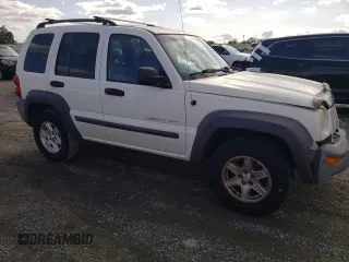 2002 Jeep Liberty Sport with VIN 1J4GL48K92W351230, listed as a Copart auction lot 51274195 with 211,716 mi miles and Salvage Title. Bid and sale history available at carsss.com. Image 4.
