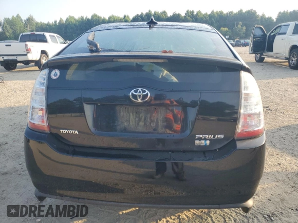 2007 Toyota Prius z VIN JTDKB20UX77600124, wystawiony jako Copart lot #61400525 z przebiegiem 102 957 mil mil oraz Czysty tytuł • Clean title. Historia ofert i sprzedaży dostępna na DreamBid. Obrazek 6.