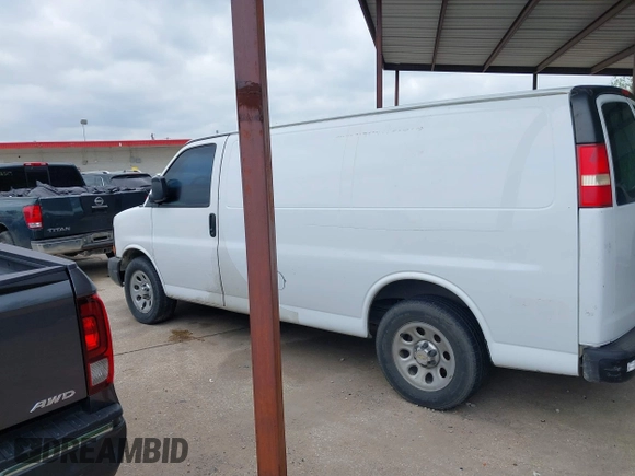 2013 Chevrolet Express Cargo with VIN 1GCSGAFX9D1179458, listed as a IAAI auction lot 42095702 with 212,186 mi miles and . Bid and sale history available at DreamBid. Image 14.