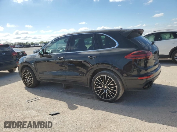 2018 Porsche Cayenne with VIN WP1AA2A27JKA04421, listed as a Copart auction lot 71092514 with 57,295 mi miles and Salvage title. Bid and sale history available at DreamBid. Image 2.