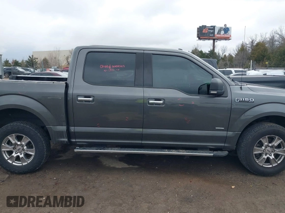2015 Ford F-150 XLT with VIN 1FTEW1EG8FKE38679, listed as a IAAI auction lot 41526976 with 137,000 mi miles. Bid and sale history available at carsss.com. Image 14.