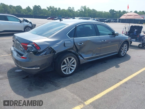 2017 Volkswagen Passat SE with VIN 1VWGT7A33HC058764, listed as a IAAI auction lot 42668036 with 76,732 mi miles and . Bid and sale history available at DreamBid. Image 4.