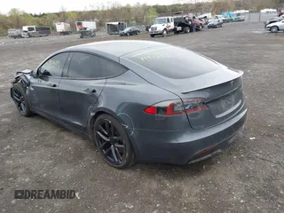 2021 Tesla Model S Long Range with VIN 5YJSA1E5XMF428519, listed as a IAAI auction lot 41926242 with 54,284 mi miles and . Bid and sale history available at DreamBid. Image 3.