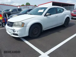 2014 Dodge Avenger SE with VIN 1C3CDZAB5EN189197, listed as a IAAI auction lot 42101613 with Not Provided miles and . Bid and sale history available at DreamBid. Image 2.
