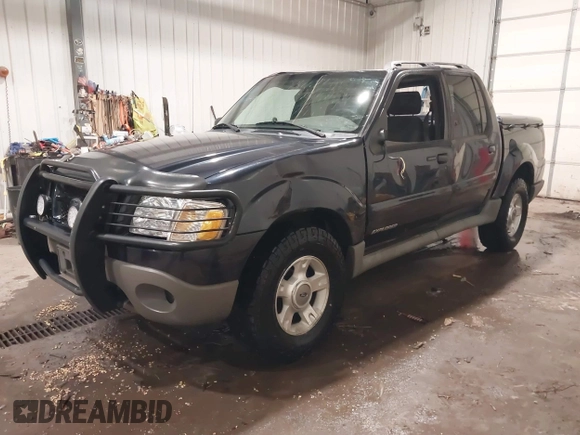 2001 Ford Explorer Sport Trac z VIN 1FMZU77E21UC84338, wystawiony jako IAAI lot #41420422 z przebiegiem 218 094 mil mil oraz . Historia ofert i sprzedaży dostępna na DreamBid. Obrazek 2.