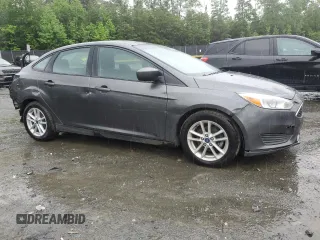 2018 Ford Focus SE z VIN 1FADP3F21JL285417, wystawiony jako Copart lot #56936965 z przebiegiem Nie podano mil oraz Czysty tytuł • Clean title. Historia ofert i sprzedaży dostępna na DreamBid. Obrazek 4.