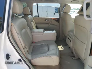 2015 Infiniti QX80 z VIN JN8AZ2NE9F9080904, wystawiony jako Copart lot #58496575 z przebiegiem 87 240 mil mil oraz Czysty tytuł • Clean title. Historia ofert i sprzedaży dostępna na DreamBid. Obrazek 11.