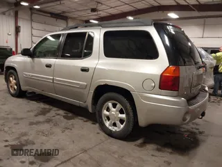 2005 GMC Envoy SLE with VIN 1GKET16S656102522, listed as a IAAI auction lot 41729310 with 233,049 mi miles. Bid and sale history available at carsss.com. Image 3.