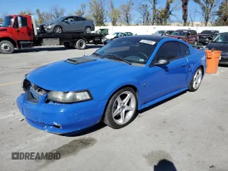 2003 Ford Mustang Premium Mach 1 with VIN 1FAFP42R43F421557, listed as a Copart auction lot 76728304 with 63,364 mi miles and Salvage title. Bid and sale history available at DreamBid. Image 1.
