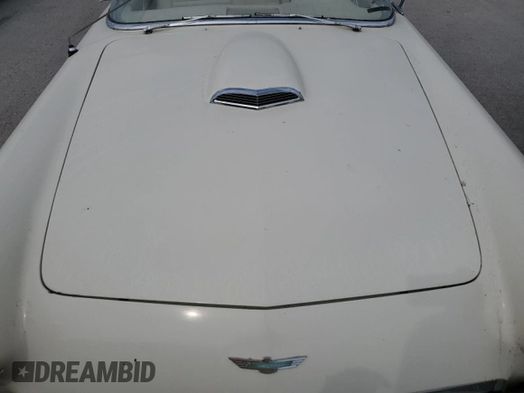 1957 Ford Thunderbird with VIN C7FH382576, listed as a Copart auction lot 75124844 with 22,465 mi miles and Salvage Title. Bid and sale history available at DreamBid. Image 11.