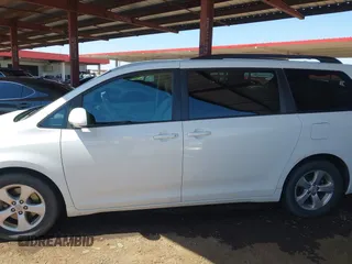 2012 Toyota Sienna LE AAS with VIN 5TDKK3DC4CS274117, listed as a IAAI auction lot 42008690 with 205,353 mi miles. Bid and sale history available at carsss.com. Image 14.
