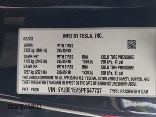 2023 Tesla Model 3 with VIN 5YJ3E1EA5PF647737, listed as a IAAI auction lot 42430145 with 20,525 mi miles and . Bid and sale history available at DreamBid. Image 9.