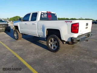 2017 Chevrolet Silverado 1500 LT with VIN 1GCVKREC7HZ216507, listed as a IAAI auction lot 41828407 with 138,294 mi miles. Bid and sale history available at carsss.com. Image 3.