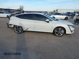 2018 Honda Clarity z VIN JHMZC5F14JC002263, wystawiony jako IAAI lot #41353651 z przebiegiem 153 401 mil mil oraz . Historia ofert i sprzedaży dostępna na DreamBid. Obrazek 13.