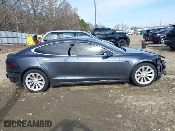 2017 Tesla Model S 100D with VIN 5YJSA1E23HF198592, listed as a IAAI auction lot 41721755 with 127,946 mi miles. Bid and sale history available at carsss.com. Image 14.