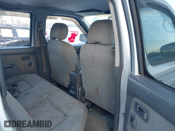 2003 Nissan Frontier SE z VIN 1N6ED29X33C433737, wystawiony jako IAAI lot #41271135 z przebiegiem 289 098 mil mil oraz . Historia ofert i sprzedaży dostępna na DreamBid. Obrazek 8.