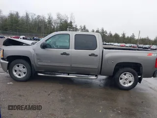 2013 Chevrolet Silverado 1500 LT with VIN 3GCPKSE75DG275651, listed as a IAAI auction lot 41805883 with 142,729 mi miles. Bid and sale history available at carsss.com. Image 15.