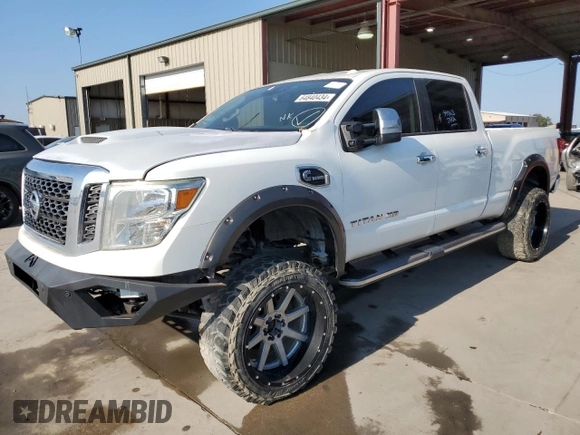 2016 Nissan Titan Platinum Reserve z VIN 1N6BA1F21GN513109, wystawiony jako Copart lot #64840434 z przebiegiem 94 263 mil mil oraz Czysty tytuł • Clean title. Historia ofert i sprzedaży dostępna na DreamBid. Obrazek 1.