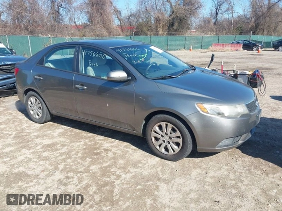 2011 Kia Forte EX with VIN KNAFU4A28B5357581, listed as a IAAI auction lot 41756806 with 296,355 mi miles. Bid and sale history available at carsss.com. Image 1.