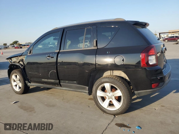 2015 Jeep Compass Latitude with VIN 1C4NJCEBXFD131484, listed as a Copart auction lot 74731464 with 76,048 mi miles and Salvage Title. Bid and sale history available at carsss.com. Image 2.