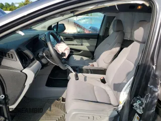 2019 Honda Odyssey EX with VIN 5FNRL6H58KB013889, listed as a Copart auction lot 57077025 with 126,467 mi miles and Salvage title. Bid and sale history available at DreamBid. Image 7.