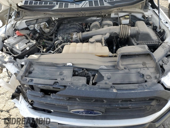 2021 Ford F-150 XL с VIN 1FTMF1EB4MKE24730, выставлен на аукционе Copart как лот 82146694 с пробегом 52 910 миль миль и Списание • Salvage title. История ставок и продаж доступна на DreamBid. Изображение 11.