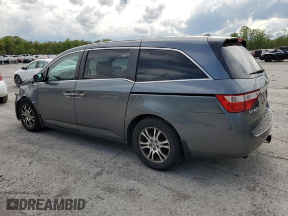 2011 Honda Odyssey EX-L with VIN 5FNRL5H6XBB002136, listed as a Copart auction lot 55162645 with 172,425 mi miles and Salvage Title. Bid and sale history available at DreamBid. Image 2.