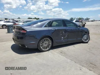 2013 Lincoln MKZ z VIN 3LN6L2GK4DR817557, wystawiony jako Copart lot #60876995 z przebiegiem 77 303 mil mil oraz Szkoda całkowita • Salvage title. Historia ofert i sprzedaży dostępna na DreamBid. Obrazek 3.