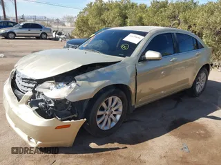 2010 Chrysler Sebring Limited with VIN 1C3CC5FB8AN207416, listed as a IAAI auction lot 41620690 with Not Provided miles and . Bid and sale history available at DreamBid. Image 6.