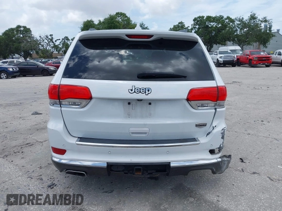 2014 Jeep Grand Cherokee Summit z VIN 1C4RJEJG1EC357948, wystawiony jako IAAI lot #42498652 z przebiegiem 213 715 mil mil oraz . Historia ofert i sprzedaży dostępna na DreamBid. Obrazek 16.