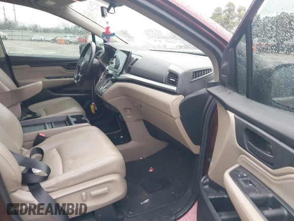2019 Honda Odyssey Touring with VIN 5FNRL6H82KB060023, listed as a IAAI auction lot 41451199 with 82,994 mi miles. Bid and sale history available at carsss.com. Image 5.