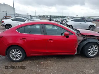 2014 Mazda 3 i Touring z VIN JM1BM1V75E1148848, wystawiony jako IAAI lot #42200934 z przebiegiem 134 176 mil mil oraz . Historia ofert i sprzedaży dostępna na DreamBid. Obrazek 14.