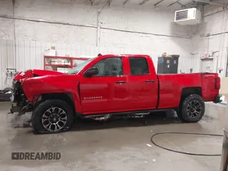 2014 Chevrolet Silverado 1500 LT with VIN 1GCVKREC2EZ407599, listed as a IAAI auction lot 41513210 with 168,352 mi miles and . Bid and sale history available at DreamBid. Image 14.