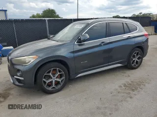 2017 BMW X1 xDrive28i with VIN WBXHT3C32H5F75870, listed as a Copart auction lot 64420385 with 158,640 mi miles and Clean title. Bid and sale history available at DreamBid. Image 1.
