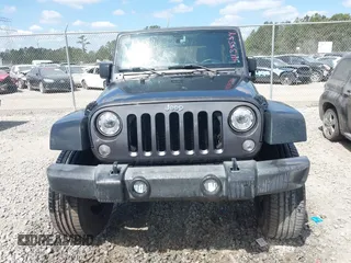 2017 Jeep Wrangler Unlimited Sport with VIN 1C4BJWDG6HL517779, listed as a IAAI auction lot 42134534 with 128,701 mi miles and . Bid and sale history available at DreamBid. Image 11.
