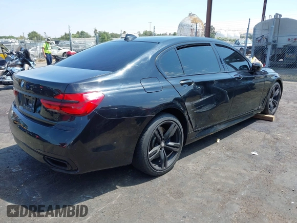 2017 BMW 7 Series 750i with VIN WBA7F0C37HGM22205, listed as a IAAI auction lot 40033800 with 70,581 mi miles. Bid and sale history available at carsss.com. Image 4.