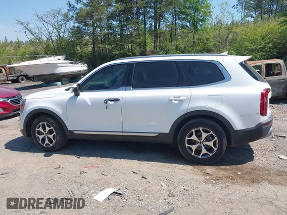 2020 Kia Telluride EX with VIN 5XYP34HC5LG008668, listed as a IAAI auction lot 42063077 with 59,480 mi miles and . Bid and sale history available at DreamBid. Image 13.