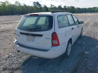 2006 Ford Focus SE with VIN 1FAFP36N76W179286, listed as a IAAI auction lot 41988568 with 277,009 mi miles. Bid and sale history available at carsss.com. Image 4.