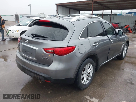 2015 Infiniti QX70 с VIN JN8CS1MUXFM380576, выставлен на аукционе IAAI как лот 41516132 с пробегом 109 662 миль миль и . История ставок и продаж доступна на DreamBid. Изображение 4.