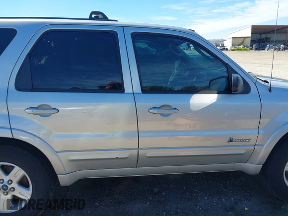 2005 Ford Escape Hybrid with VIN 1FMCU95H45KD16867, listed as a IAAI auction lot 41661311 with 206,698 mi miles. Bid and sale history available at carsss.com. Image 13.