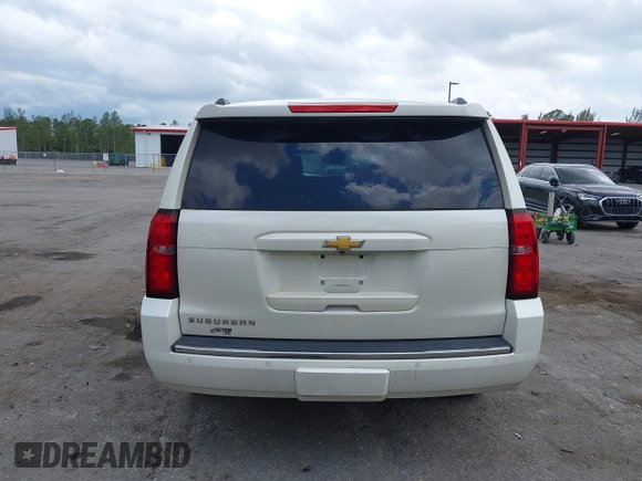 2015 Chevrolet Suburban LTZ with VIN 1GNSKKKC4FR687923, listed as a IAAI auction lot 42192062 with 139,873 mi miles and . Bid and sale history available at DreamBid. Image 16.