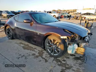 2015 Nissan 370Z with VIN JN1AZ4EH1FM442502, listed as a Copart auction lot 48332035 with 101,462 mi miles and Salvage Title. Bid and sale history available at carsss.com. Image 4.