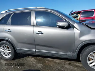 2014 Kia Sorento LX with VIN 5XYKTCA63EG506217, listed as a IAAI auction lot 42050413 with 126,806 mi miles and . Bid and sale history available at carsss.com. Image 13.