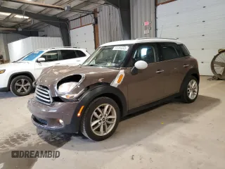 2012 MINI Countryman with VIN WMWZB3C52CWM01672, listed as a Copart auction lot 56064265 with 97,267 mi miles and Salvage Title. Bid and sale history available at DreamBid. Image 1.