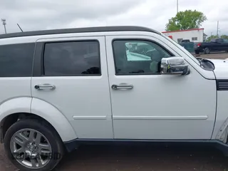 2011 Dodge Nitro Heat z VIN 1D4PU4GK7BW598432, wystawiony jako IAAI lot #42252036 z przebiegiem 148 329 mil mil oraz . Historia ofert i sprzedaży dostępna na DreamBid. Obrazek 13.