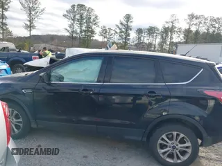 2017 Ford Escape SE with VIN 1FMCU9G93HUA51924, listed as a IAAI auction lot 41711537 with 163,297 mi miles and . Bid and sale history available at carsss.com. Image 14.