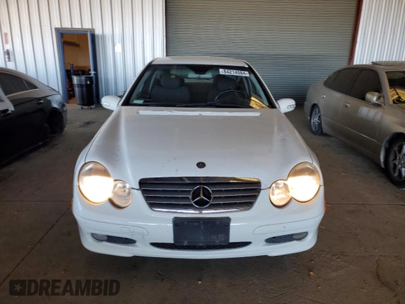 2003 Mercedes-Benz C 230 Kompressor with VIN WDBRN40J83A432695, listed as a Copart auction lot 84214584 with 131,550 mi miles and Salvage title. Bid and sale history available at DreamBid. Image 5.